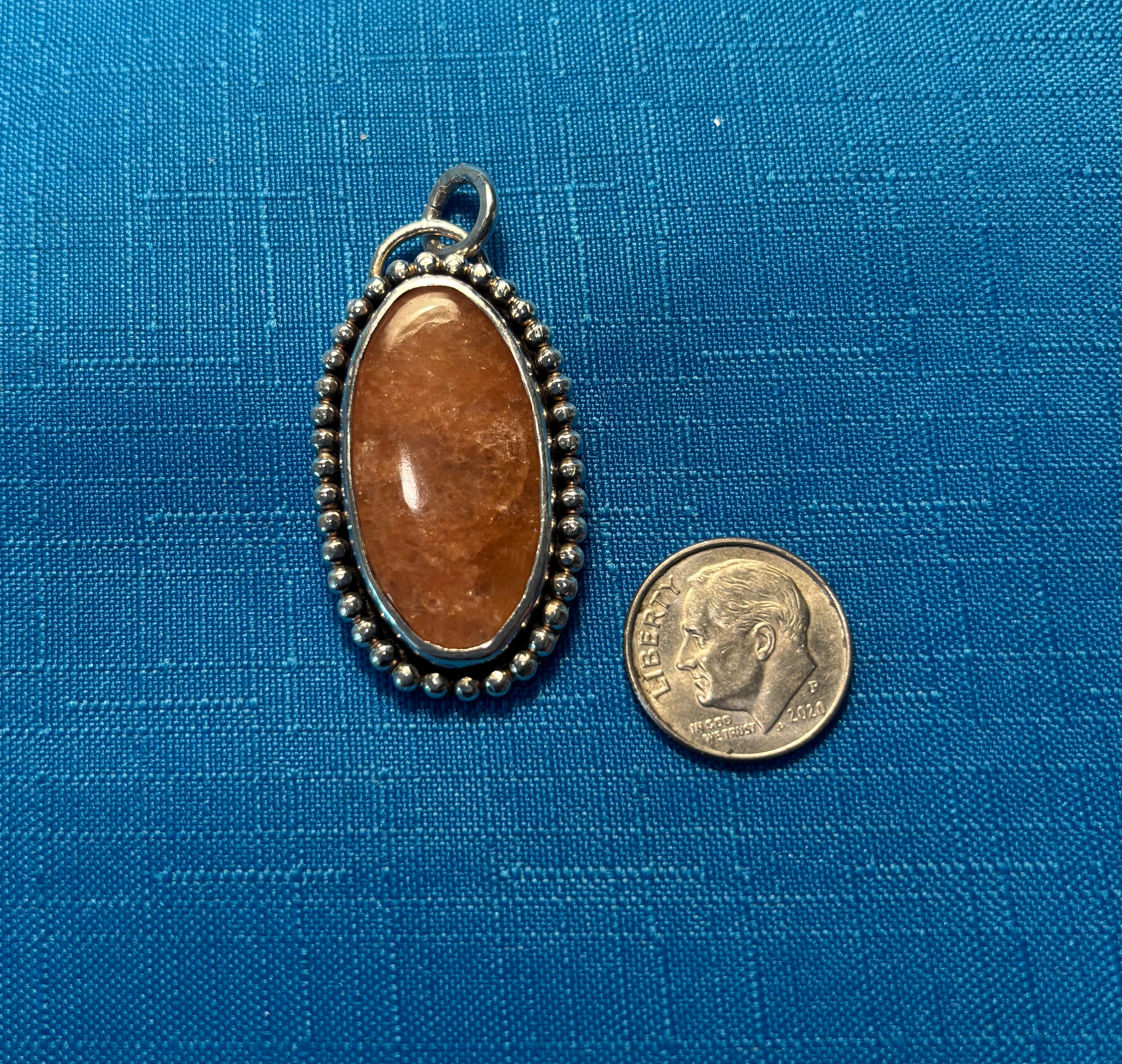 Sterling Silver & Orange Sunstone Pendant